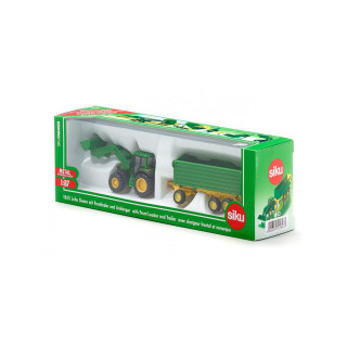 Traktor sa bagerom i prikolicom 