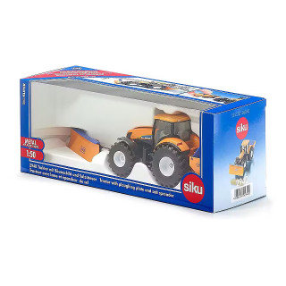 Traktor sa plugom za oranje i posipačem 