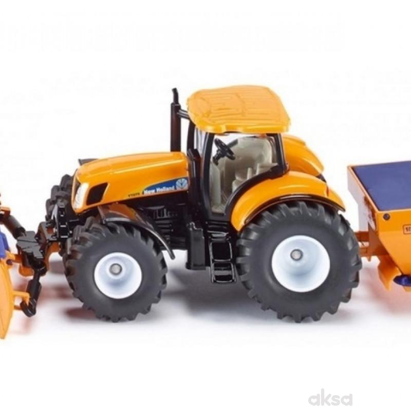 Traktor sa plugom za oranje i posipačem 