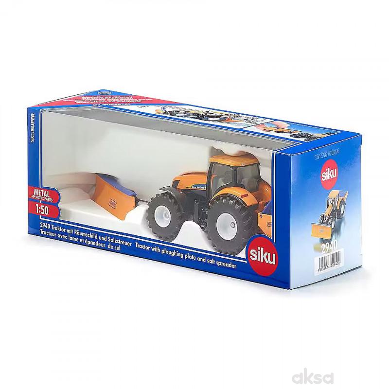 Traktor sa plugom za oranje i posipačem 